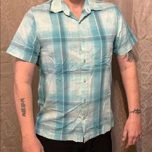 Trait Men’s top size Medium